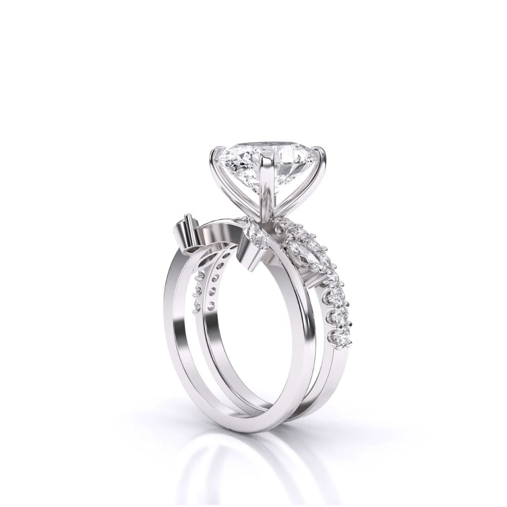 Oval Cut Diamond Ring with Leaf-Inspired Band
